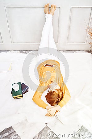 The girl is listening to music happily. Stock Photo