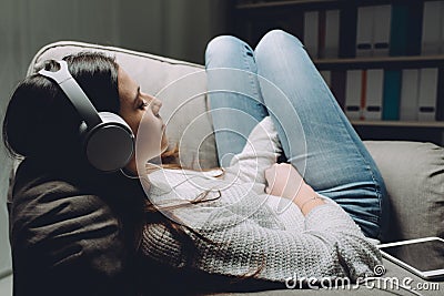 Girl listening to relaxing music Stock Photo