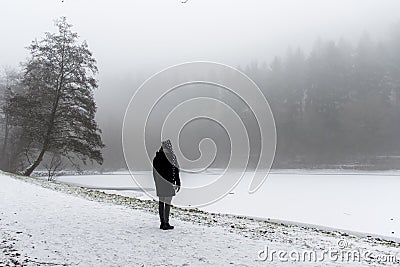 Girl lonely walking path and trees Winter wonder land Stock Photo