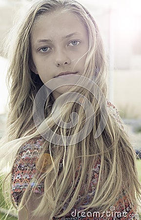 Girl with long blond hair Stock Photo