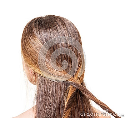 The girl with long brown hair braided strands of isolated. Stock Photo