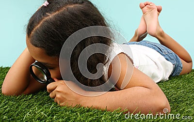 Girl Looking At Bugs Stock Photo