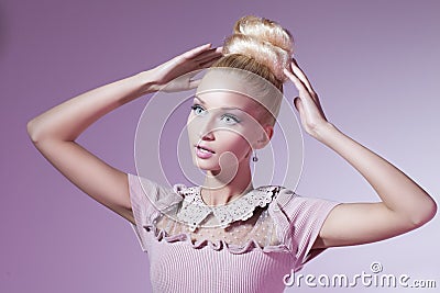 Girl looking like Barbie doll Stock Photo