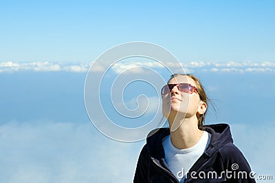 Girl looking in the sky Stock Photo