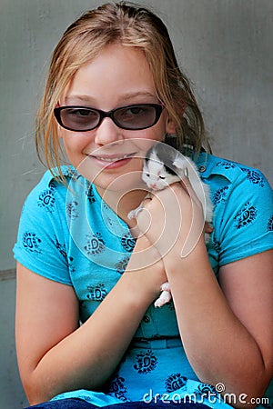 Girl Loves Kitty Stock Photo