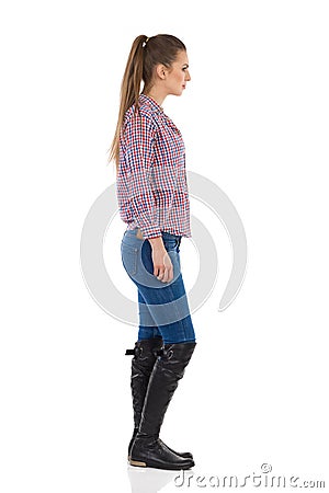Girl In Lumberjack Shirt Side View Stock Photo