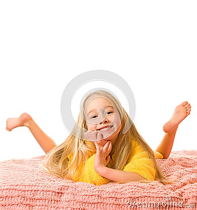 Girl lying on a bed Stock Photo