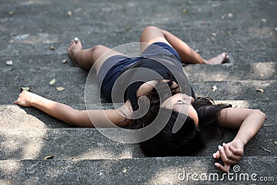 Girl lying down bare feet Stock Photo