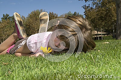 Girl lying on grass Stock Photo