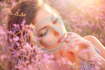 Girl Lying on a Meadow Stock Photo