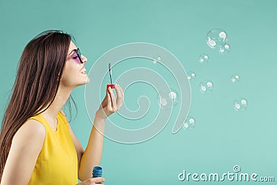 Girl Makes Bubbles Stock Photo