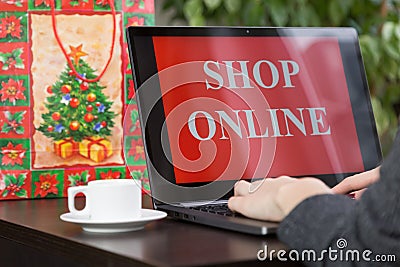 Girl makes purchases over the internet on christmas Stock Photo