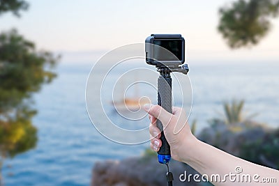 The girl makes a video on the vacation Stock Photo