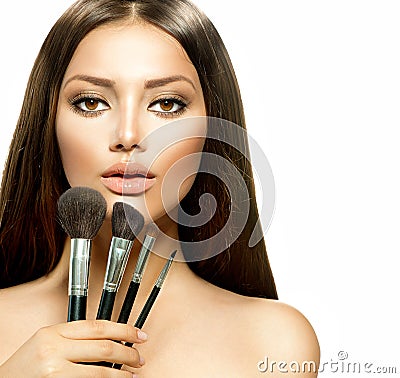 Girl with Makeup Brushes Stock Photo