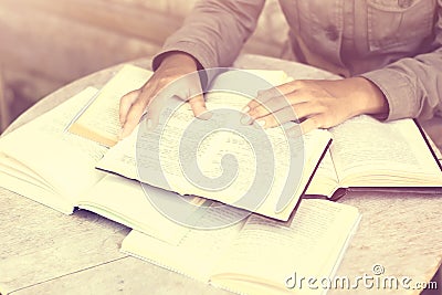 Girl with many open books Stock Photo
