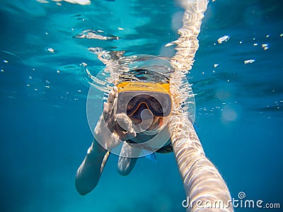 Selfie of young woman snorkeling in the sea. Making everything ok symbol Stock Photo