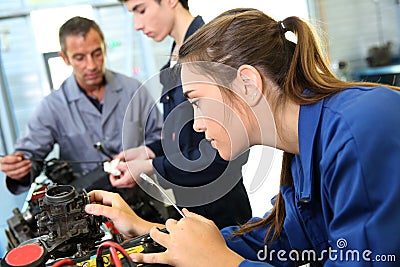 Girl in mechanics class Stock Photo