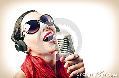 Girl with microphone Stock Photo