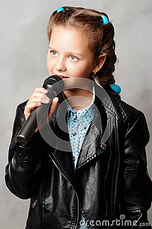 Girl with microphone Stock Photo