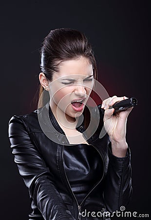 Girl with microphone Stock Photo