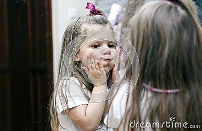 Girl and mirror Stock Photo