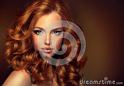 Girl model with long curly red hair. Stock Photo