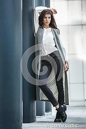 Girl near column Stock Photo