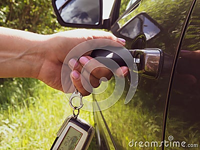 girl opens the car Stock Photo