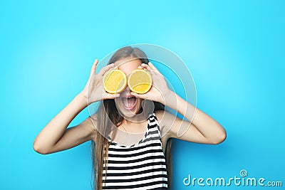 Girl with orange fruit Stock Photo