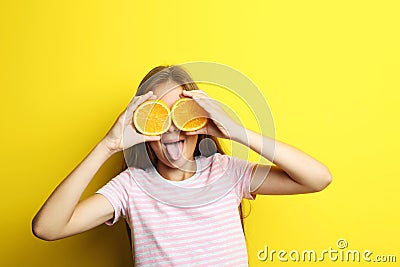 Girl with orange fruit Stock Photo