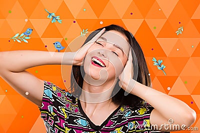 Girl on orange geometric background with birds and colorful spot Stock Photo