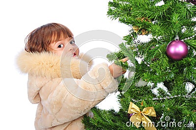 Girl over christmas tree Stock Photo