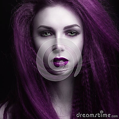 The girl with pale skin and purple hair in the form of a vampire. Insta color. Stock Photo