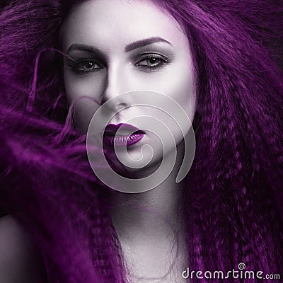 The girl with pale skin and purple hair in the form of a vampire. Insta color. Stock Photo