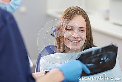 Girl patient of a dentist doctor close-up watching an x-ray Stock Photo