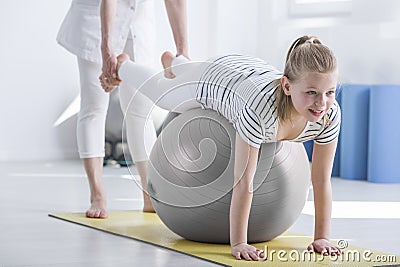 Girl during pediatric occupational therapy Stock Photo