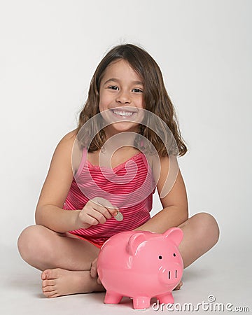 Girl with piggy bank Stock Photo