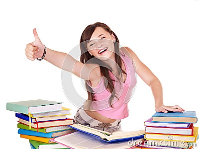 Girl with pile book showing thumb up. Stock Photo