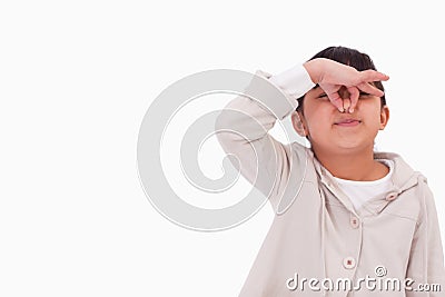 Girl pinching her nose Stock Photo