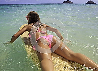 Girl in pink bikini at the beach Stock Photo