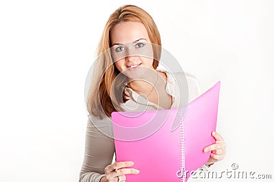 Girl with a pink folder on light background Stock Photo