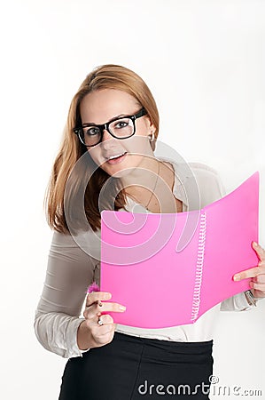 Girl with a pink folder on light background Stock Photo