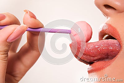 Girl with pink lollipop Stock Photo