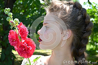 Girl with pink mallow Stock Photo