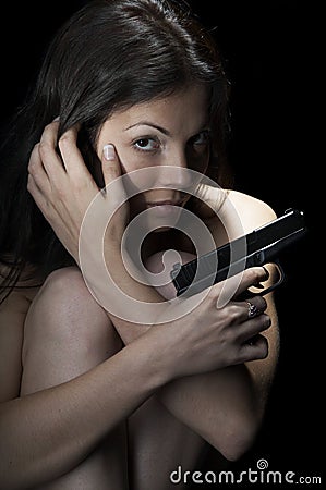 The girl with a pistol Stock Photo