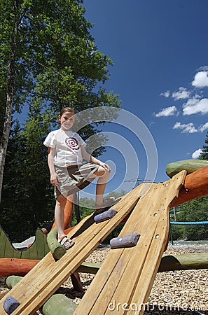 Girl On Playground Stock Photo