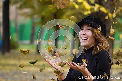 Girl playing autumn foliage Stock Photo