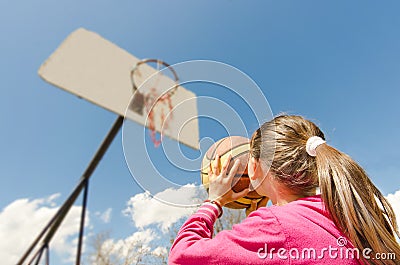 Girl playing basketball Stock Photo