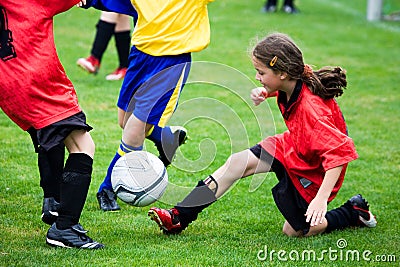 Girl playing football Stock Photo