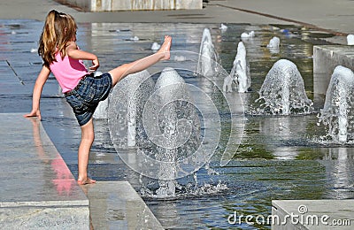 Girl Enjoys Water Fountain Editorial Stock Photo
